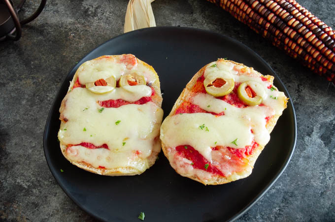Mummy Cheese bread is made with 4 ingredients and requires no artistic talent!  Make this easy halloween-themed food for a festive Halloween Party #halloweenfood #halloweentheme #mummyfood ##halloweenideas westviamidwest.com/mummy-cheese-b…