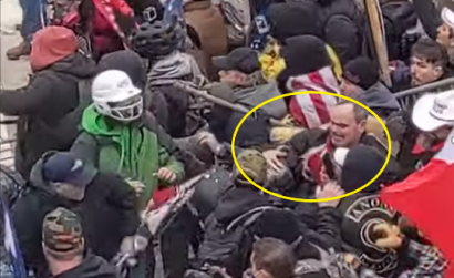 SeditionHunters's tweet photo. Why we do What we do! #SeditionHunters This officer shoved into the crowd and attacked by no less that 5 different men. What did he do when he got free? He went back to the line to stand guard again! #Respect https://t.co/NScAP0waCC