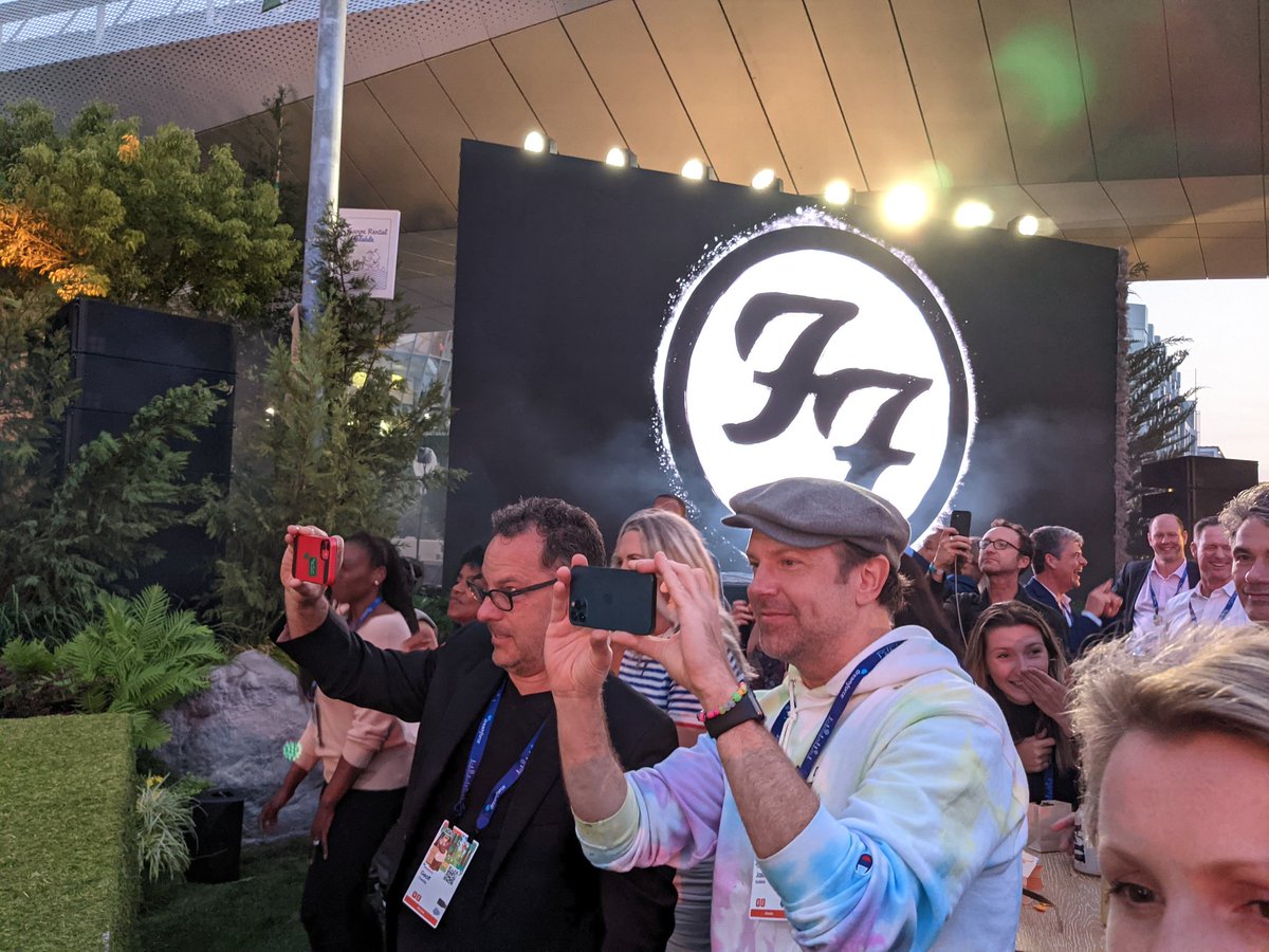 saracamden's tweet photo. My new definition of catharsis: I just watched the @foofighters dance like fools with a bunch of inflatable mascots on stage while @TedLasso  watched &amp; now I can't stop crying 😭🥰 Well done, @Benioff #DF21 https://t.co/z6AFIHcFCG