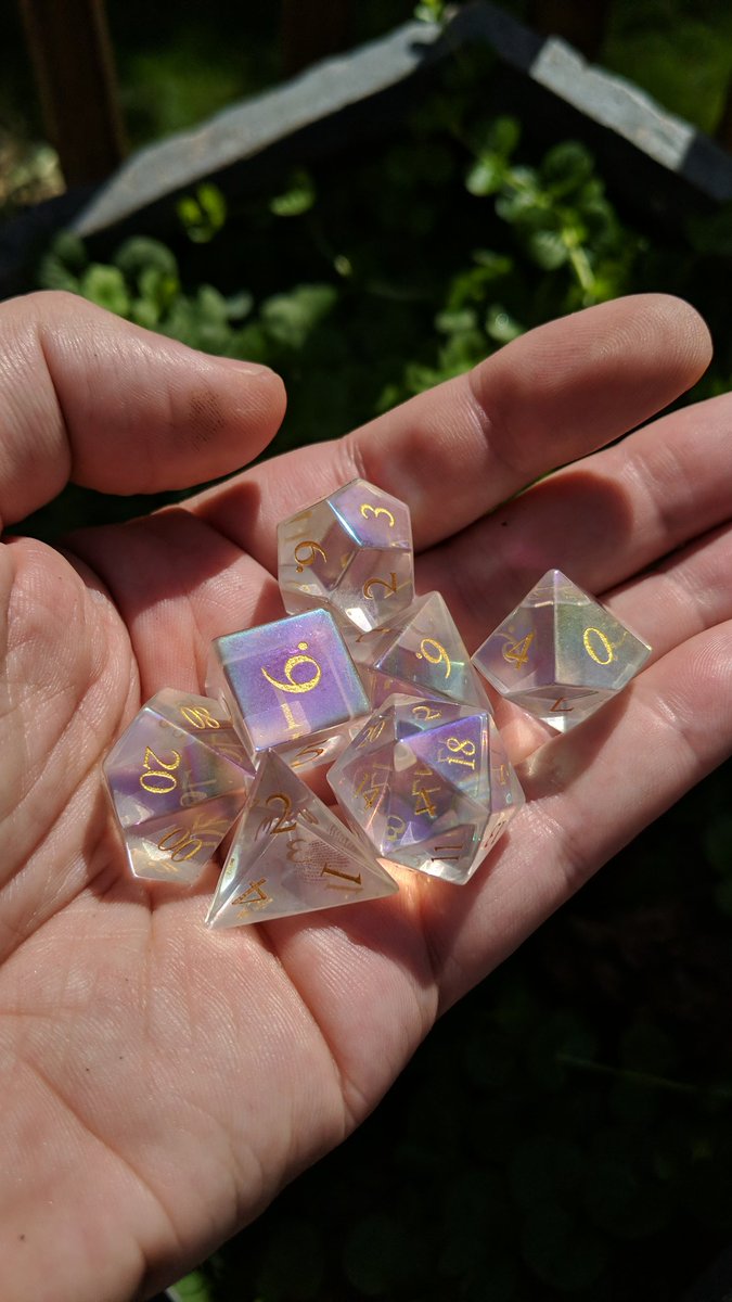 We often hear from our customers that pictures don't do justice to our dice, but the vibrant prismatic effect of these dichroic gemstone beauties just takes that comment to another level! Get yours fast, we have a very limited supply 👉 bit.ly/3hQ8Ijd #dice #dnd #ttrpg