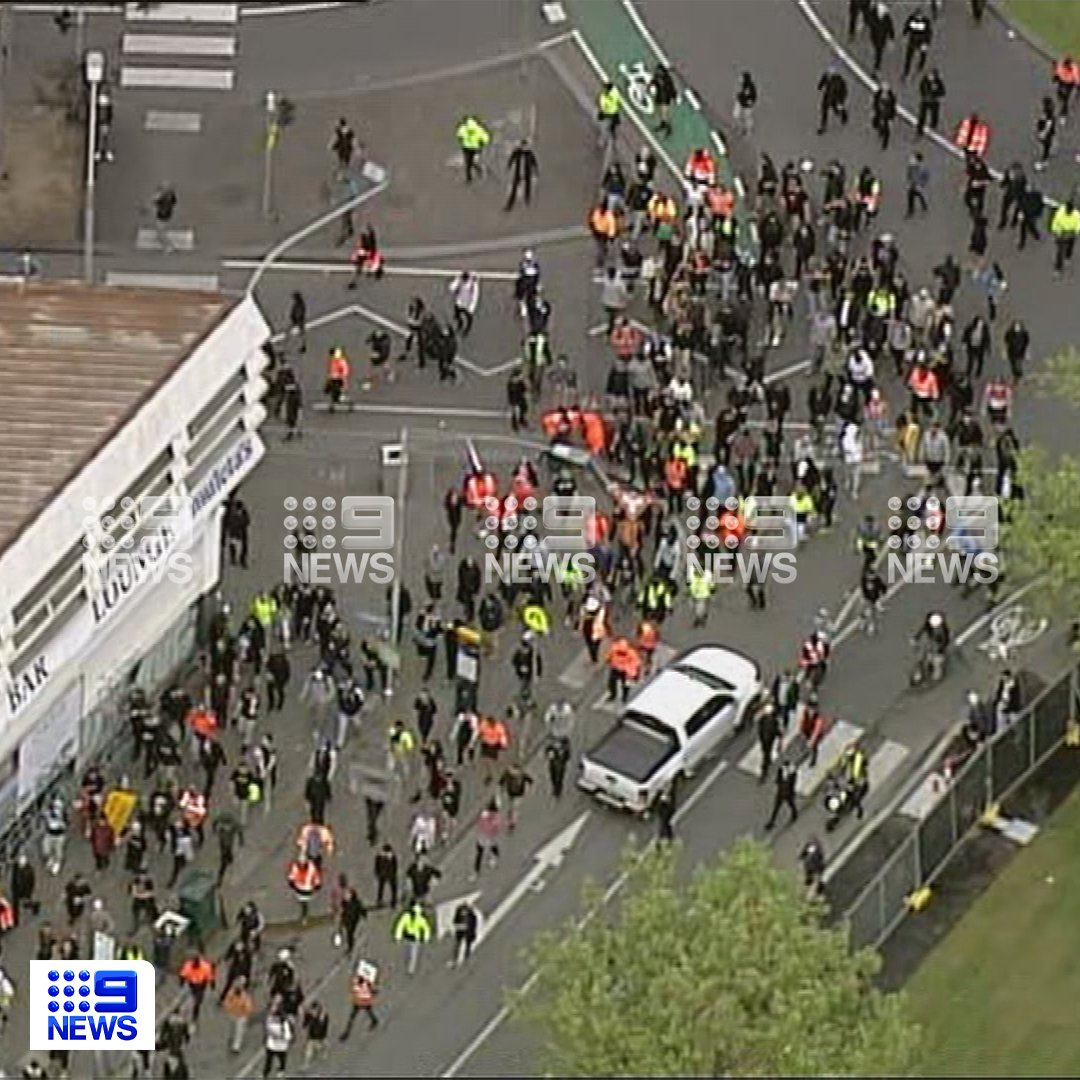 9NewsMelb's tweet photo. DEVELOPING: Protesters have ignited flares at Queen Victoria Market, as angry crowds continue to make their way through Melbourne's CBD.

READ MORE: https://t.co/5mAzIrcCbi

#9News https://t.co/RaXMdiWRat