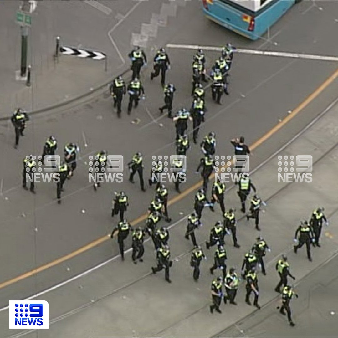 9NewsMelb's tweet photo. DEVELOPING: Protesters have ignited flares at Queen Victoria Market, as angry crowds continue to make their way through Melbourne's CBD.

READ MORE: https://t.co/5mAzIrcCbi

#9News https://t.co/RaXMdiWRat
