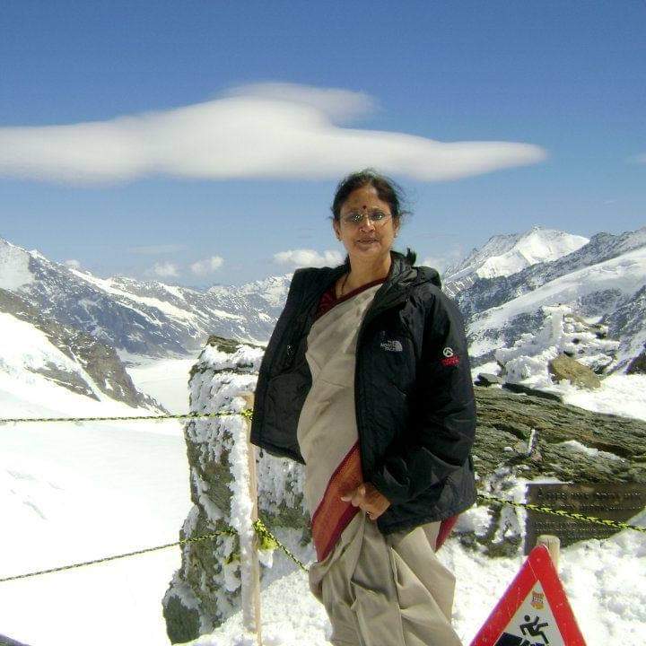 PPhanje's tweet photo. Aquila resturant in Delhi stopped a lady from entering as she wore saree, which according to them is not a smart wear. Shame on you Aquila resturant 😡. My mom wearing saree on the top of Alps. They didn't stopped her for what she was wearing. https://t.co/Ju5uq767ud