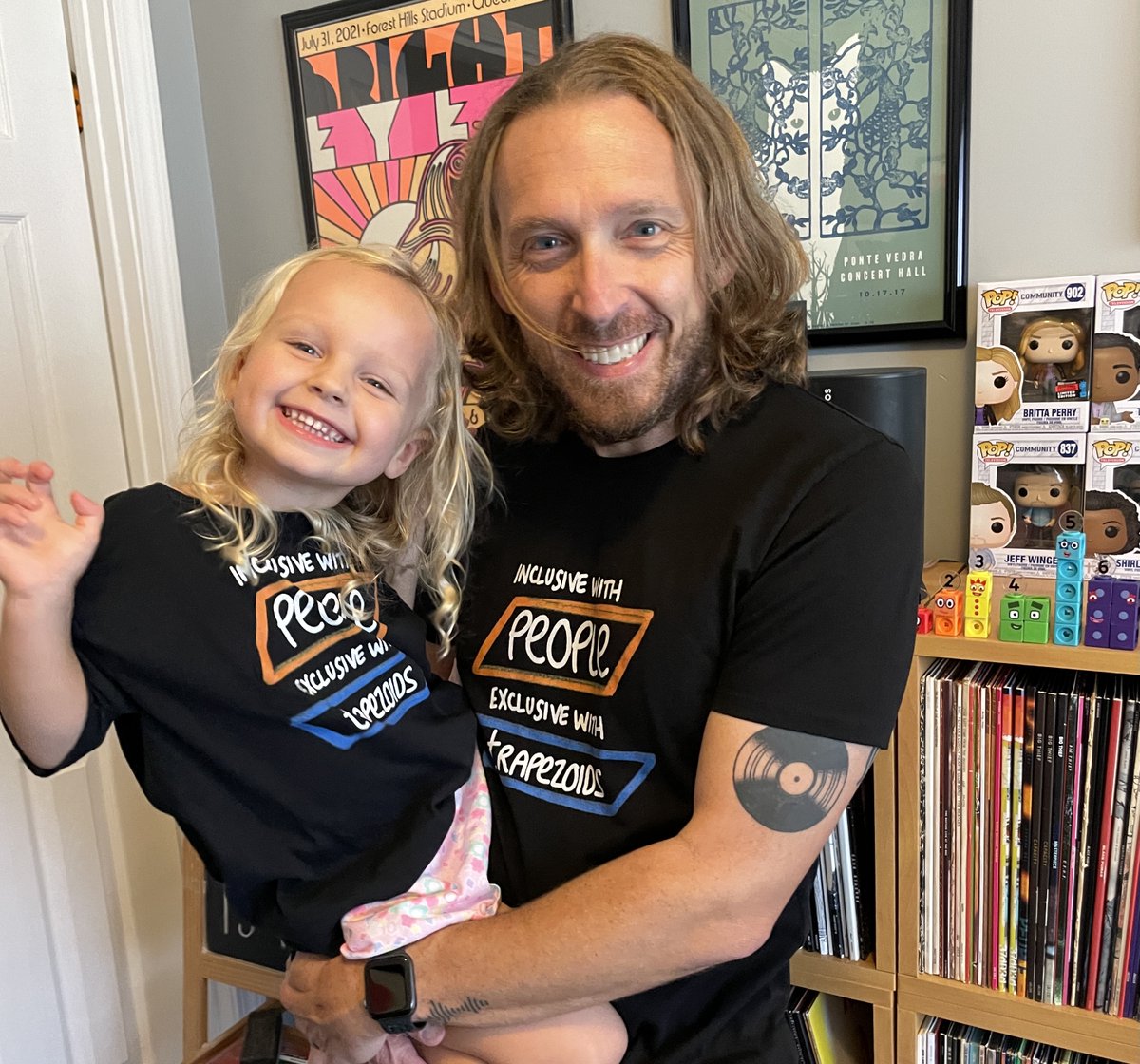 Trapezoid fans!

The time has come. <a href="/BerkeleyEverett/">Berkeley Everett</a>, <a href="/hellokritty/">kristin welch</a>, <a href="/Sneffleupagus/">Shelby is on bsky 💗💜💙</a>, &amp; I worked to create the ultimate trapezoid showdown.

We are all inclusive with folx, but we differ on trapezoids. 

Declare your allegiance here. 

berkeleyeverett.com/shirts/

I'm #teamexclusive