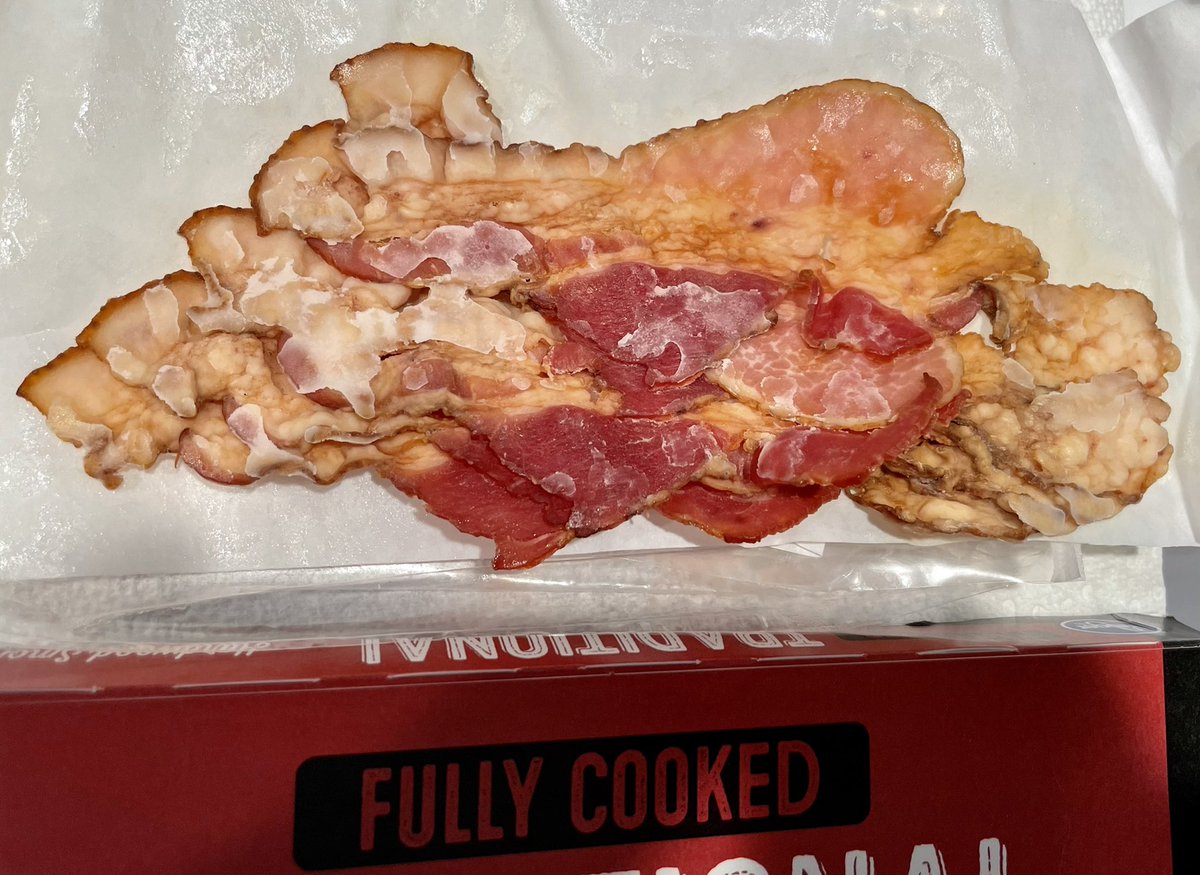 LisaR_san's tweet photo. @kroger just opened a package of bacon… and this is what was inside.  Yuck! https://t.co/38oNnei5ge