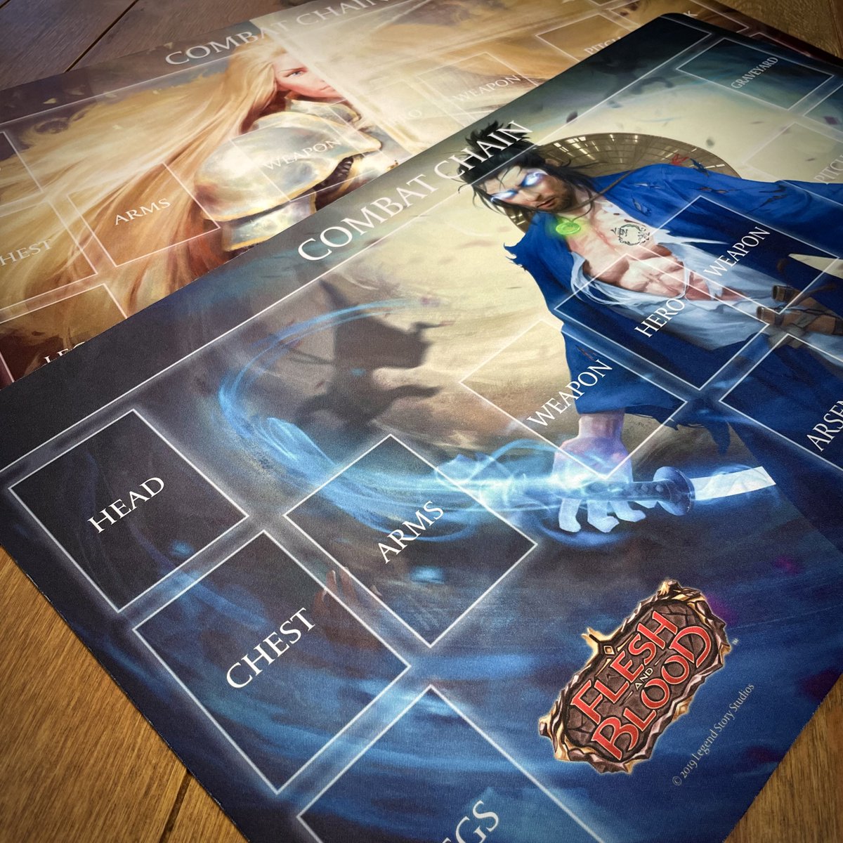 TCtulsa's tweet photo. At our Sealed Saturday on October 9th, we’ll be giving out these beautiful, Flesh and Blood TCG playmats as random, participation prizes. Learn more about the event: https://t.co/frCPTkB9wn #FABTCG https://t.co/bddJLxymR1