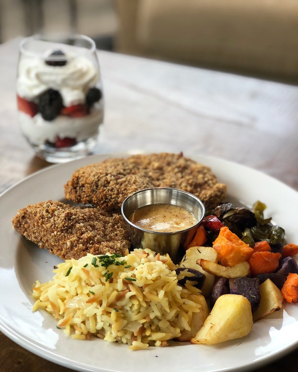 We enjoyed serving a special menu seated luncheon in our private venue today. Pictured: pecan crusted chicken, rice pilaf, roasted vegetables, &amp; berries with cream. 😋