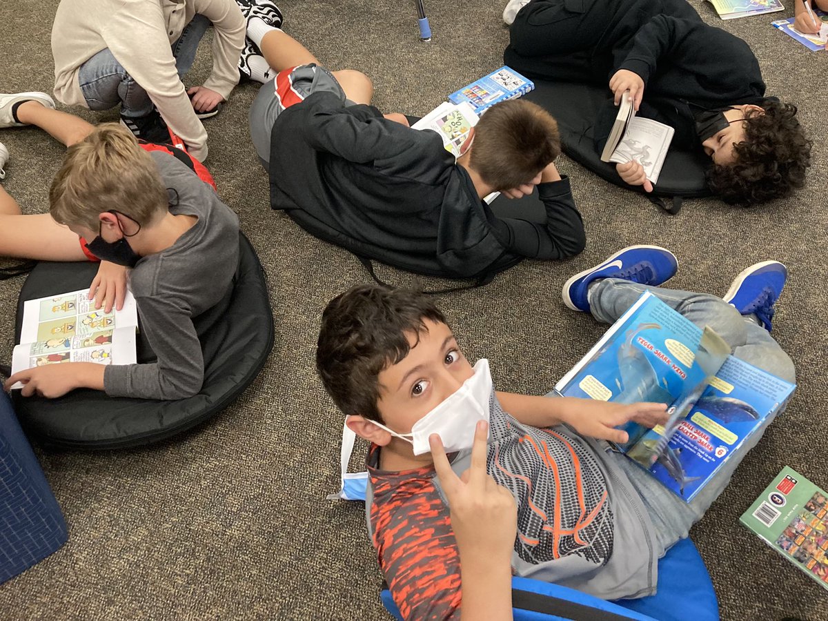 RESLibrary_DCS's tweet photo. Fifth graders enjoying our new chairs bought with Scholastic book fair dollars. The book fair is back this fall October 5-14! https://t.co/KkavK2dudL