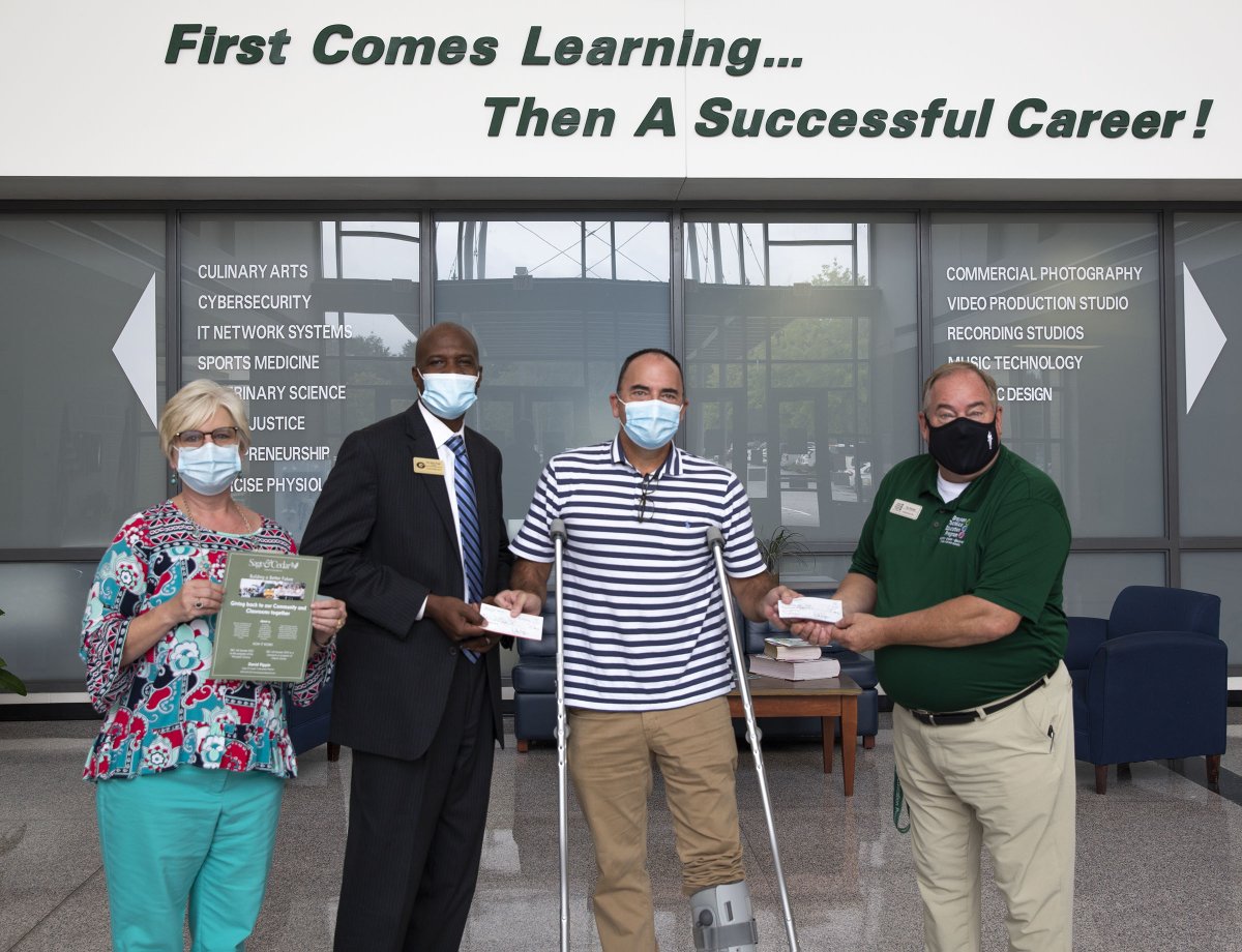 It's a great day at Grayson Tech! Our new business partner Sage &amp; Cedar presented a donation today to our IT/Game Design Program! We can't say thank you enough to Mr. David Pippin for your generosity and partnership! #partnerships #CTE