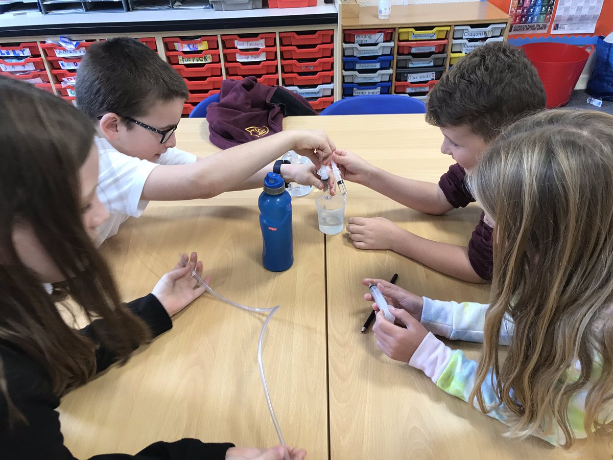 missmcindoe's tweet photo. We then created a simple hydraulic system using the same equipment and water. We experimented with different ways of filling the system with water whilst avoiding air bubbles. Tomorrow we will use what we have learned to build a model with moving parts 😊 https://t.co/KyHYxJzKZN