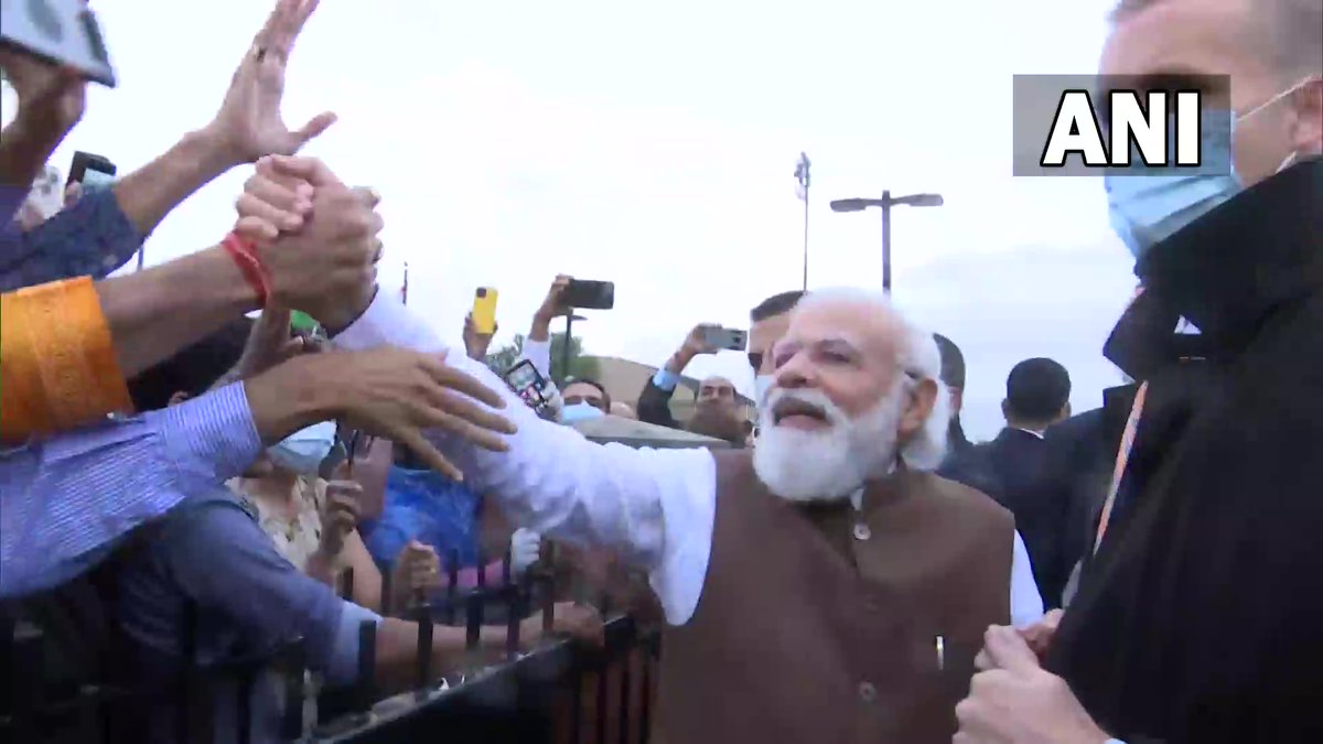 ANI's tweet photo. US: Prime Minister Narendra Modi meets people who were waiting to welcome him at Joint Base Andrews in Washington DC https://t.co/YkAWQSPCI3