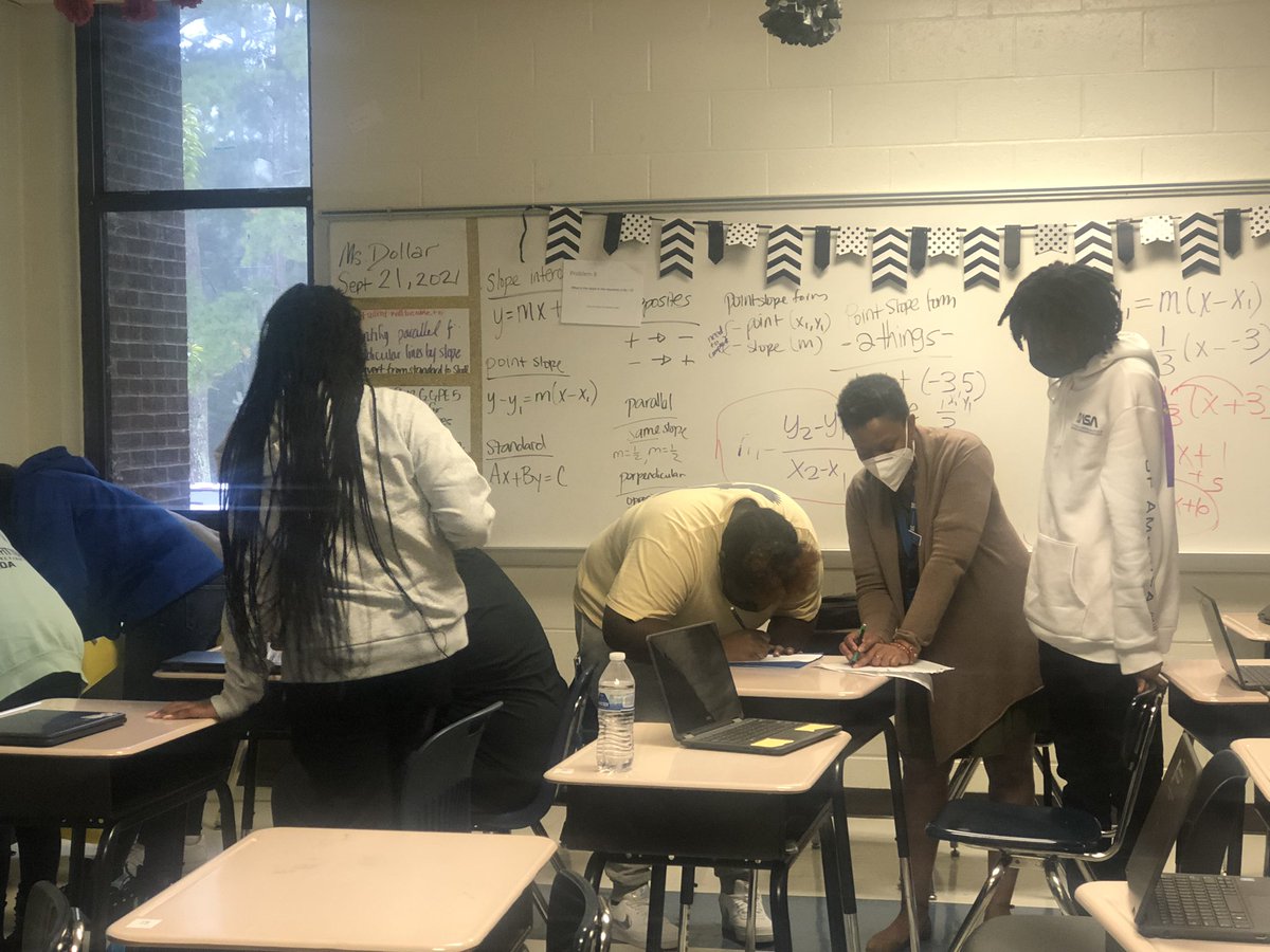 DrSDollar's tweet photo. Students were engaged completing a gallery walk covering slope, parallel, and perpendicular lines! Sometimes we have to get up and move to solve our problems! #math #mathislit #HHS https://t.co/x70nqEgVvV