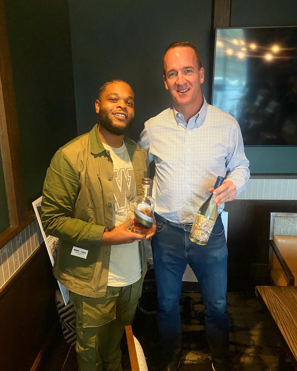 wheresmikeg's tweet photo. Who’s the 🐐 in Indy? #WheresMikeG drinking $200 whiskey 🥃 with the homie Peyton Manning! Hope you enjoy your bottle of Sherrce big dawg! 🥂 https://t.co/kSAeryJxil