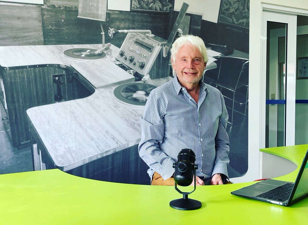 HFCSAdelaide's tweet photo. Our Principal sitting in the Podcast/Virtual Reality Suite in our school with a circa 1930 ABC backdrop. We are reflecting on fantastic learning spaces we have created in the past few years and thinking our learning community is the world’s best kept secret.We are hiring for 2022 https://t.co/SxtDreVlha