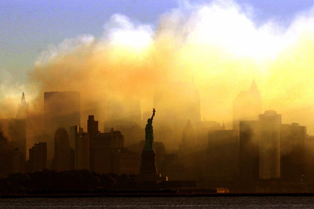 The Statue of Liberty can be seen from Jersey City, New Jersey, as the Lower Manhattan skyline remains shrouded in smoke on September 15, 2001.

#NeverForget #911Memorial #911Anniversary #Honor911 #911Museum #NeverForget #NeverForget911