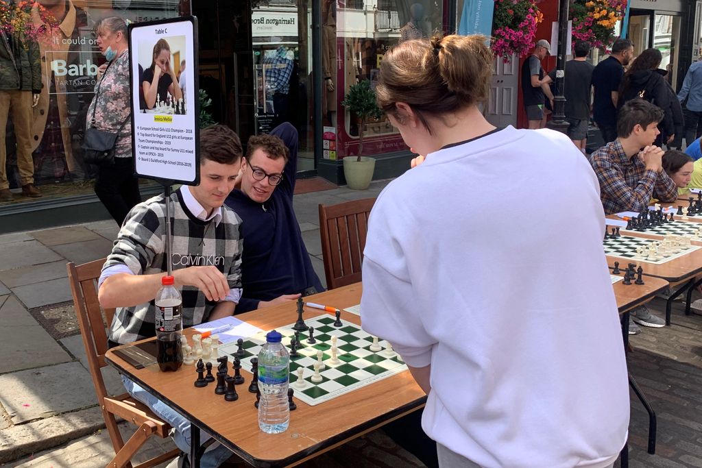 RGSGuildford's tweet photo. #RGSChess Great to see so many RGS students &amp; OGs involved in the 125 Board simul on the High Street given by some of the top Chess players in England &amp; staged by @ChessGuildford in celebration of their 125th anniversary. @RGSOG https://t.co/q6rxTnSwbq