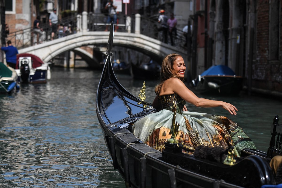 Jennifer Lopez climbs aboard a gondola ahead of a photoshoot for Dolce &amp; Gabbana in Venice