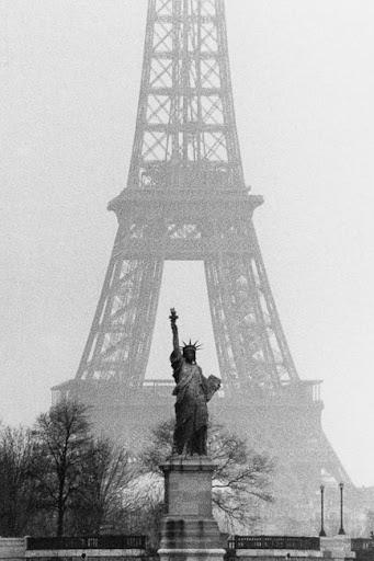 Marc Riboud. 
La Tour Eiffel et la Statue de la Liberté   1964   #Paris #France #USA