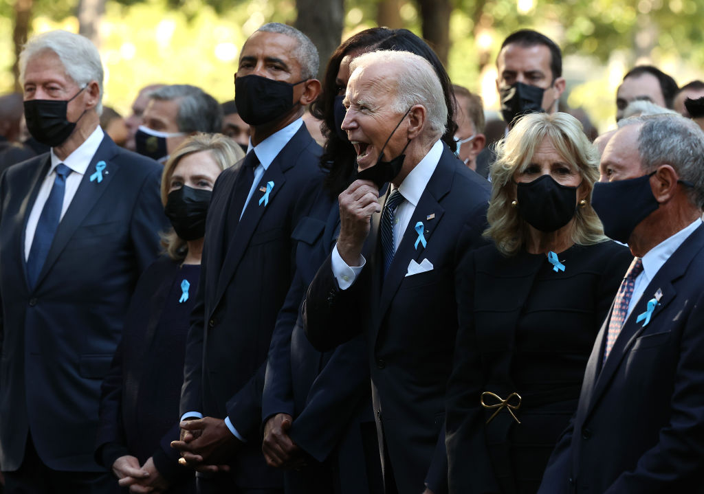 charliespiering's tweet image. Getty captures Joe Biden pulling down his mask to shout out at someone in the crowd at the 9/11 ceremony