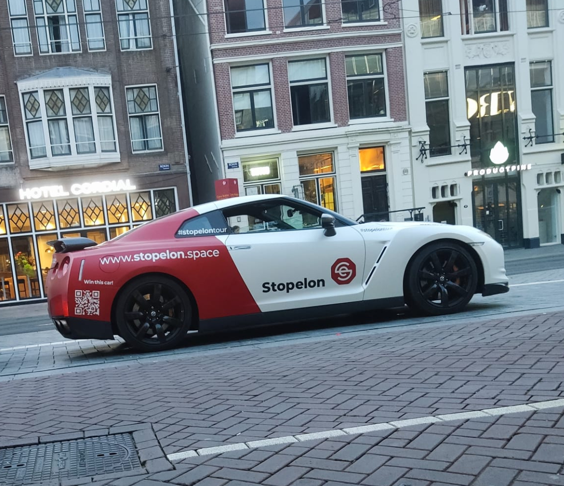 STOPELON_BSC's tweet photo. @BananaMediaQ And it's not the only protest in town today! The world's first protest cryptocurrency #Stopelon is on the first leg of its #Stopelontour in Amsterdam too. Find us in our customized GT-R and join the fight against market manipulation! https://t.co/pvVlZVxzzl https://t.co/3AFvQLTu3X