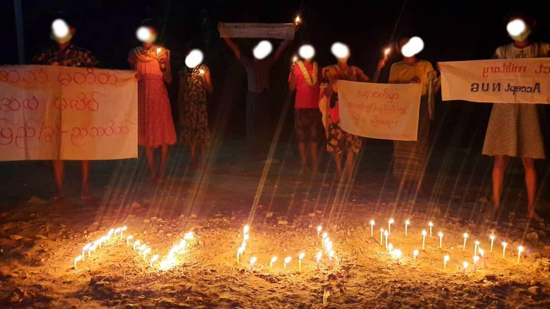 MyoTheint_74's tweet photo. #PyiGyiTakon Night Strike led by the monk was successfully held tonight against Military Coup.Protesters demonstrated “NUG” with lightning candles, showing their support to @NUGMyanmar and calling @UN to recognize NUG.
#UN_RecognizeNUG
#Sep11Coup
#WhatsHappeningInMyanmar https://t.co/UFcAX8hwsy