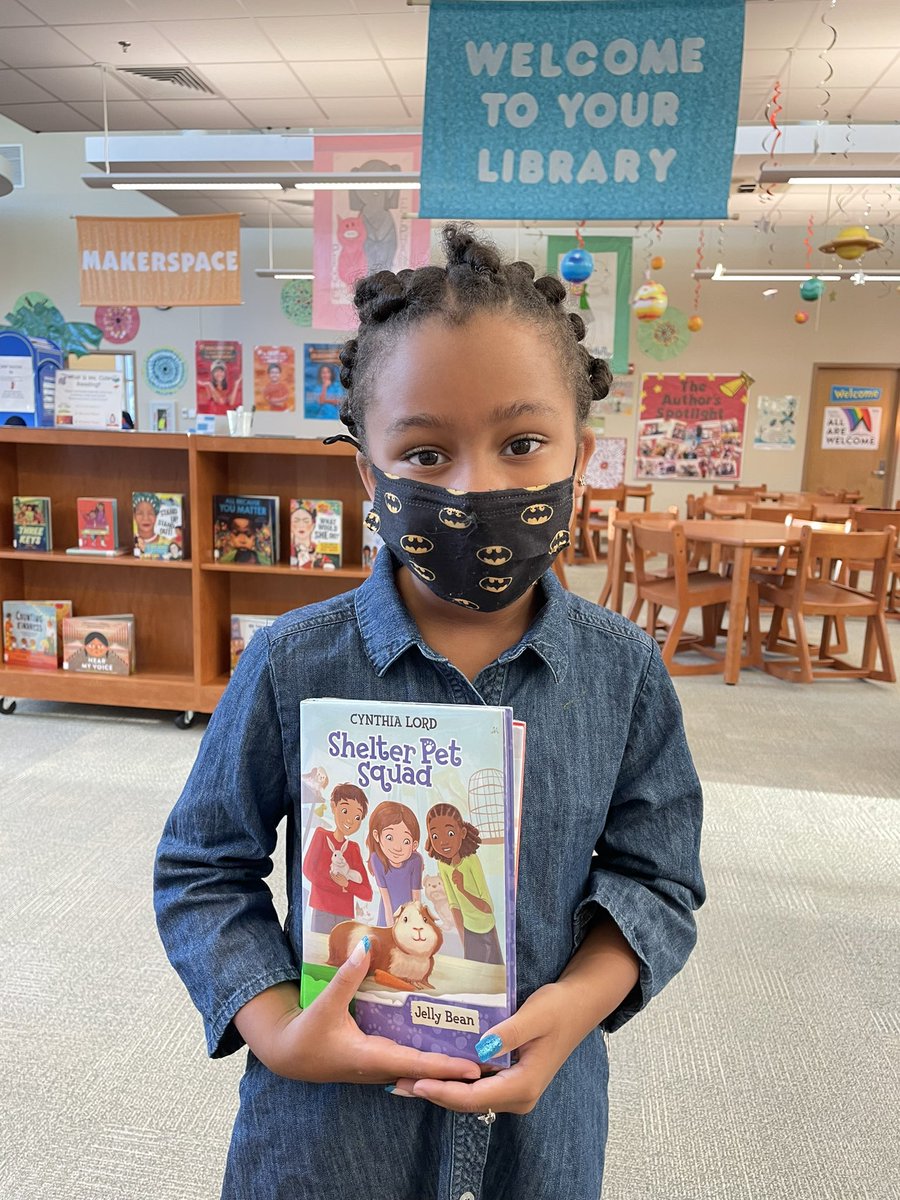 NESlibrary's tweet photo. Sheβs at it again. Weβve decided we need to capture her daily library journey. We β€οΈ her morning visits so very much. @SymonsSpeaksUp @NorthsideES #NavigatorsREAD #NavigatorStrong #StoryJOY https://t.co/cM6mhs0ZF5