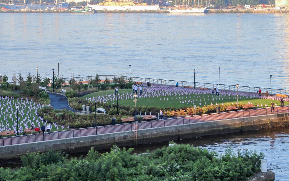 amwater's tweet photo. To commemorate the 20th anniversary of 9/11, American Water installed a display of 2,977 American flags—one for each life lost—on the RCA Park Pier in @CityofCamdenGov. A short ceremony at the installation paid tribute to all who impacted, including fire and police personnel. https://t.co/aJDplYBH1o