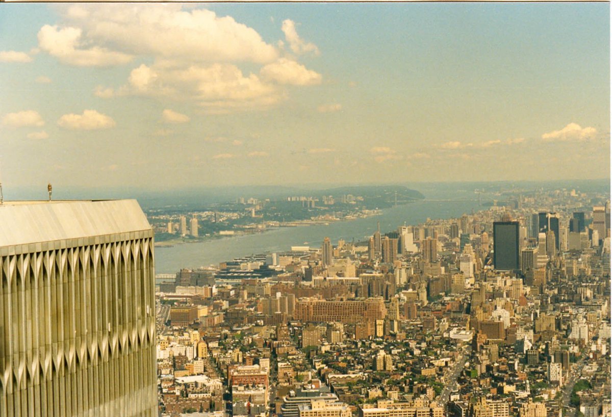 wolandlondon's tweet photo. The world was sweeter when a 13yo me took this from the observation deck atop #2WTC. 13yrs later, the world we knew vanished before our eyes while we drifted into an age of darkness, fear, anger and lies. It’s time to leave our terror behind and trust again.
#911Anniversary #WTC https://t.co/FPnhyHlTYH