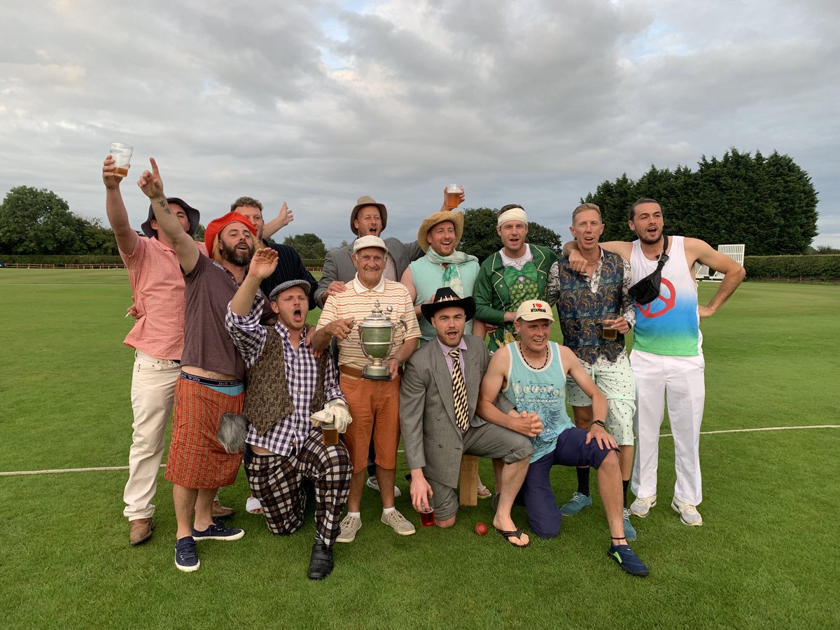 Nantwich CC President Norman Bloor joins the 1st XI as they celebrate the title success.