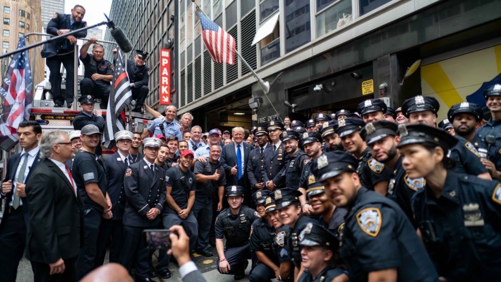 JackPosobiec's tweet image. President Trump standing with the FDNY and NYPD today