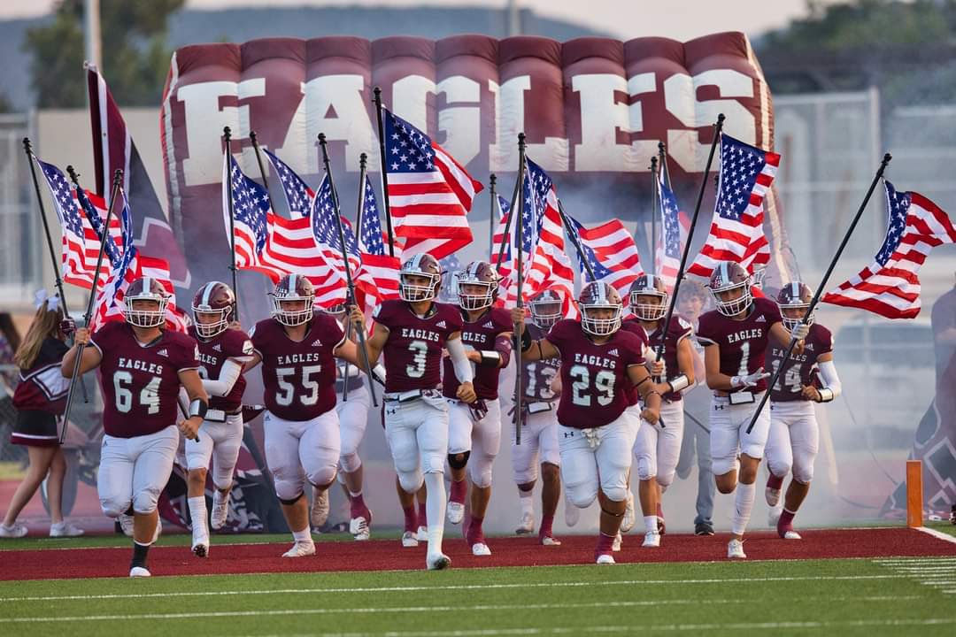 CoachJB71's tweet photo. In recognition of 9/11, every Eagle player carried the Stars and Stripes. #jcnation #jcathletics #unitedwestand https://t.co/HLmpt57lwG