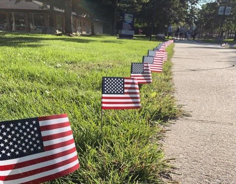 kentmacdonald's tweet photo. As you walk through the Northwood campus today, you will see flags lining a portion of the roadways and sidewalks. The men of Kappa Sigma spent today placing 2978 flags.  Each flag represents one life lost on September 11, 2001. Thank you gentlemen. https://t.co/FRgr6WM1ES