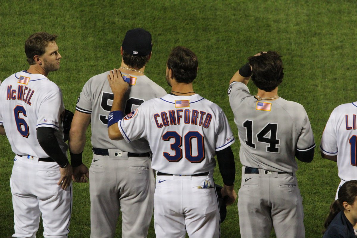 Such a cool gesture: The Mets and Yankees just took the field together and are toeing the line together "as one, unified New York."