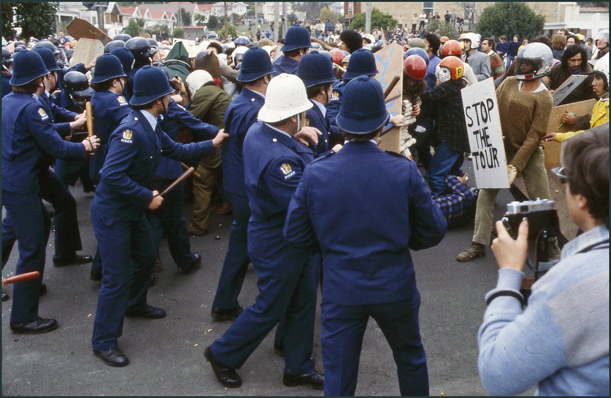 TweetTheTour's tweet photo. 📡LIVE: Patu Squad &amp; police clash on Walters Rd:

Reporter: "I've never seen anything more horrific in my life. There are people lying on the street, blood everywhere."

Tigilau Ness: "We got beaten pretty bad. There were a lot of people on the ground."

📸Photos: John Miller https://t.co/E1sKOZ6cuy