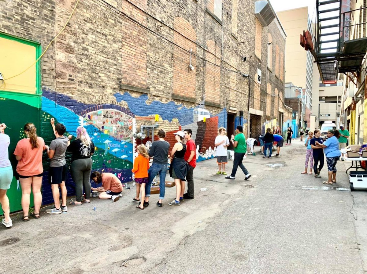 cityofduluth's tweet image. Yesterday volunteers helped local artists complete a project which was a part of the Duluth Street Art Initiative. The project which is located behind the 100 block of West Superior Street. Even LT. Chad Nagorski and Sargent Kelly Greenwalt jumped in to help!
