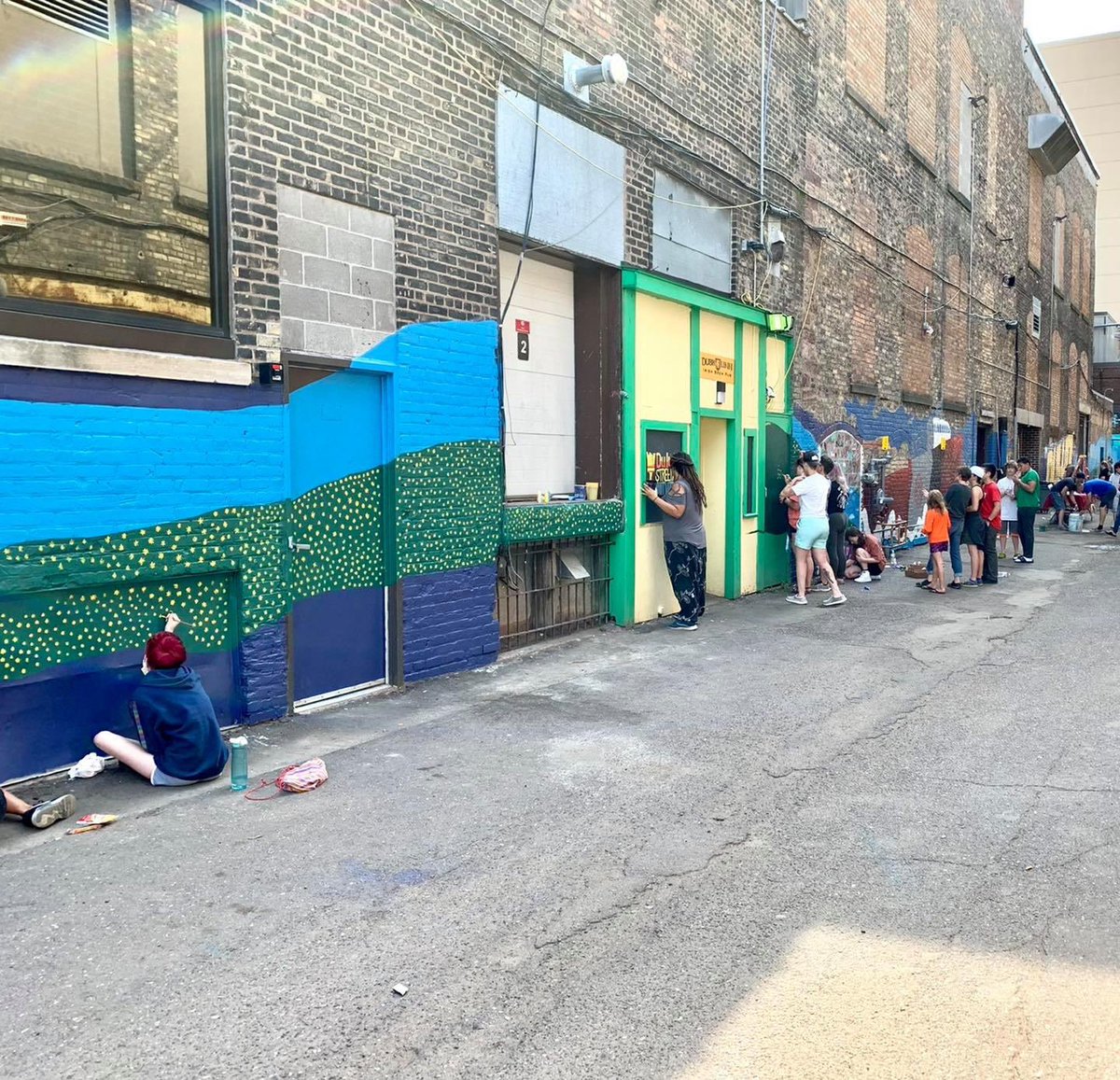 cityofduluth's tweet image. Yesterday volunteers helped local artists complete a project which was a part of the Duluth Street Art Initiative. The project which is located behind the 100 block of West Superior Street. Even LT. Chad Nagorski and Sargent Kelly Greenwalt jumped in to help!
