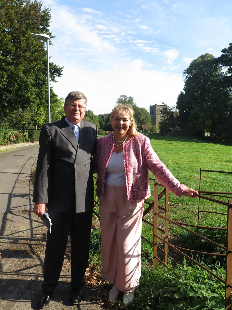 susanjcarey's tweet image. A passing dog walker kindly offered to take a photo of John &amp;amp; me on our way to #Saltwood church this morning (15th Sunday after Trinity) &amp;amp; here's a pic of a peacock on the loose on my return journey. Oh and @JustinWelby conducted the service. #NormalSunday