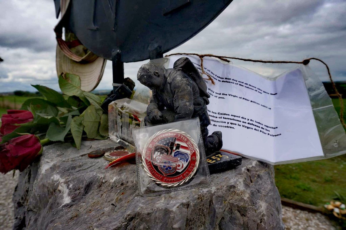 FireIreland's tweet photo. Dublin Fire Brigade September 11th 20th Anniversary Coin yesterday placed on the Kinsale 9/11 Garden of Remembrance memorial in County Cork

Our thanks to Ret FF Jeremaih Aherne for placing it there for us

#NeverForget #September11 https://t.co/eiFeMPdvKA