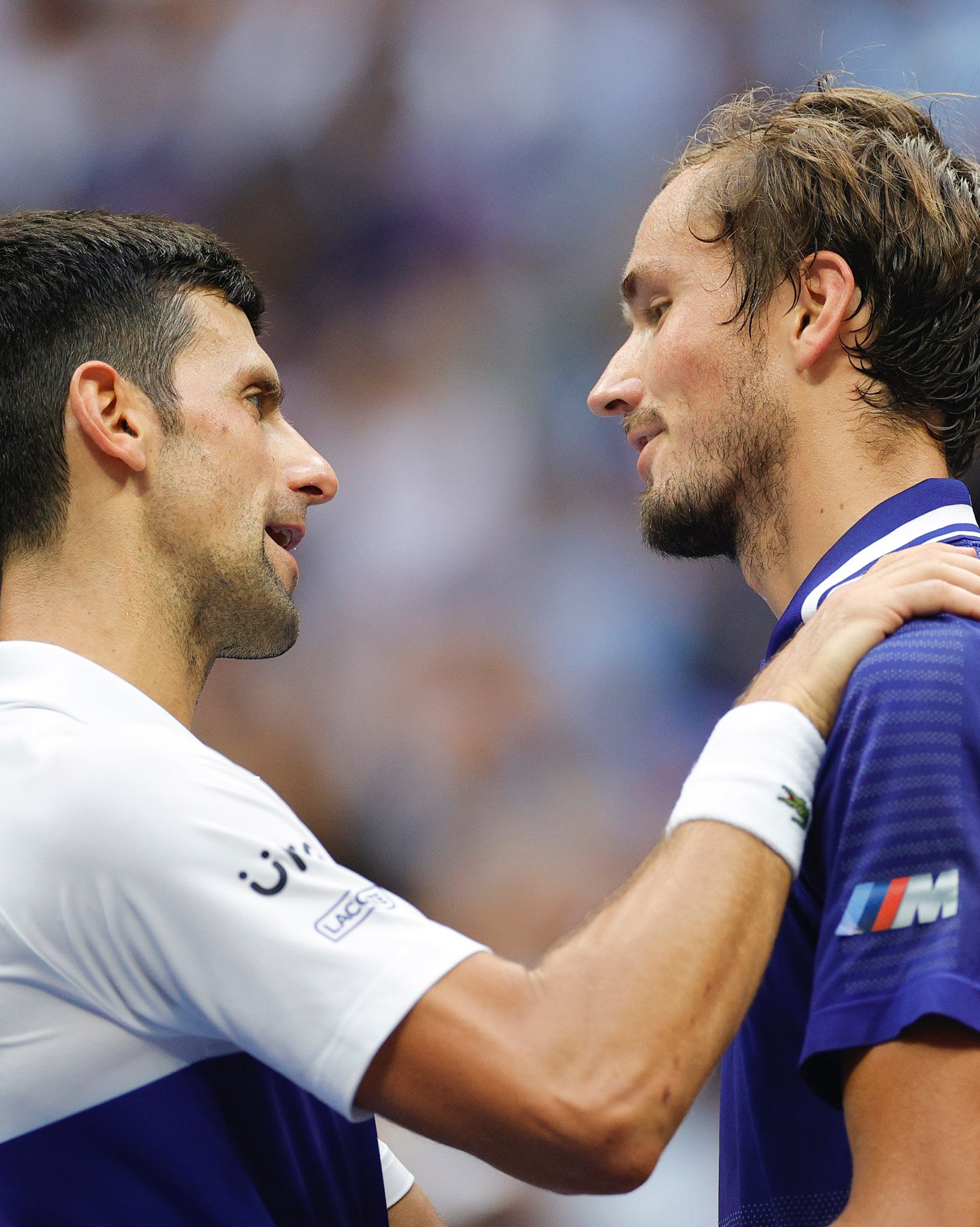 Daniil Medvedev (R) of Russia and Novak Djokovic (L) of Serbia talk at center court after Medvedev won their Men's Singles final match on Day Fourteen of the 2021 US Open at the USTA Billie Jean King National Tennis Center on September 12, 2021 in the Flushing neighborhood of the Queens borough of New York City.