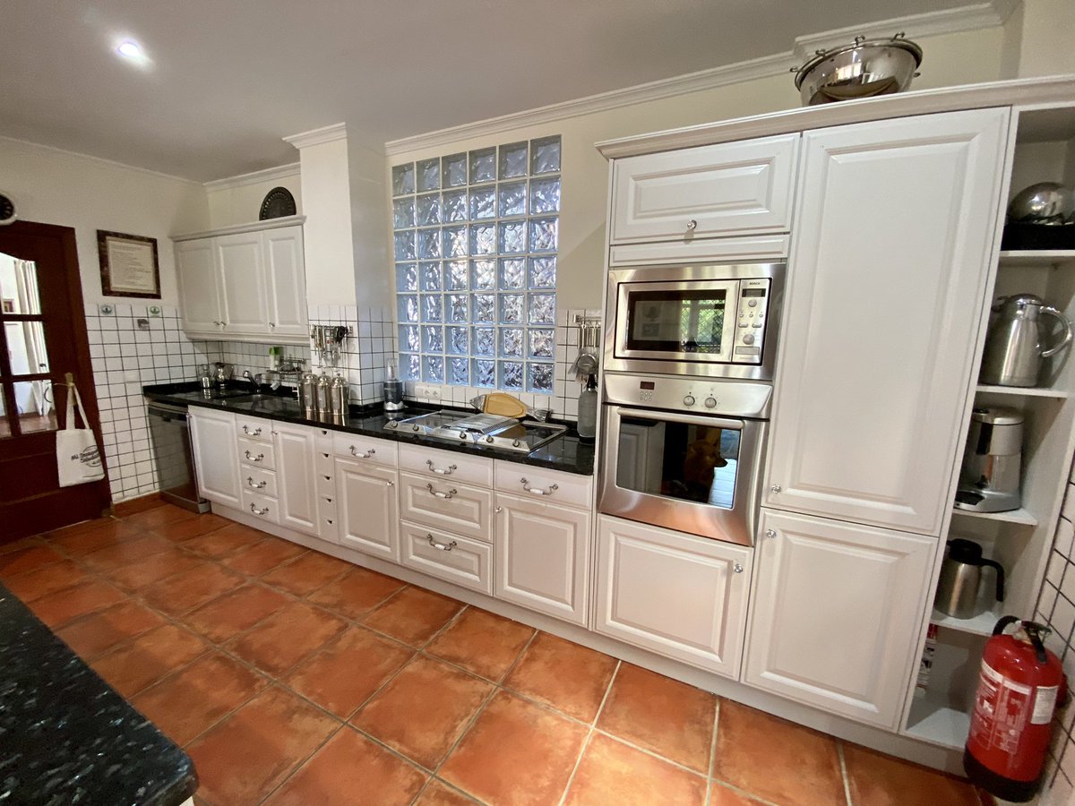 painted_kitchen's tweet photo. A much softer look with a match to Ammonite for a 23yr old kitchen - clients had a Parrot which swears in a Scottish accent too☺️ #handpaintedkitchen #parrottalk #kitchenmakeover https://t.co/PZhYcYc1P5