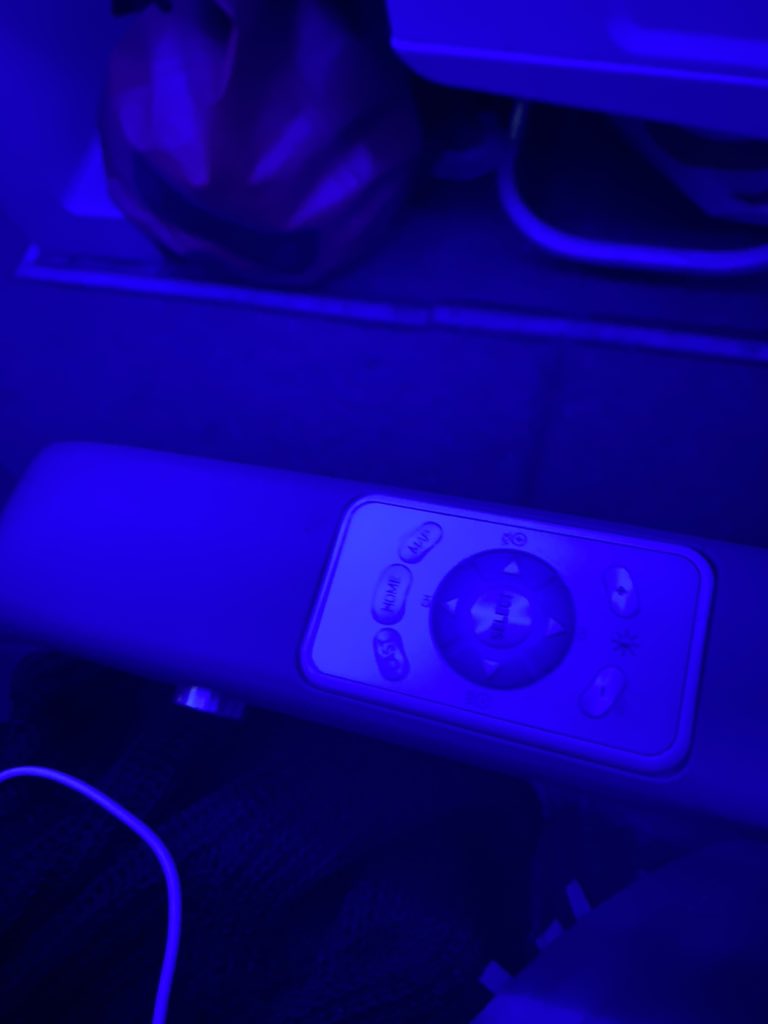Sacha_Baumann's tweet photo. I was convinced that someone else was controlling my lil JetBlue tv screen cuz it kept scrolling and pausing and picking different shows and there was nothing I could do. And then I realized it was my elbow on the controls. Ha ha #ghostinthemachine #shittydesign https://t.co/Ulf956nwGP