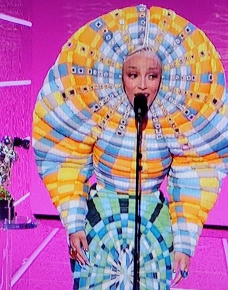 Merlin6c's tweet photo. And we thought #Sethward 's outfits were bad on #AGT . Maybe he can make #DojaCat one #VMA https://t.co/opZbEq6bM7