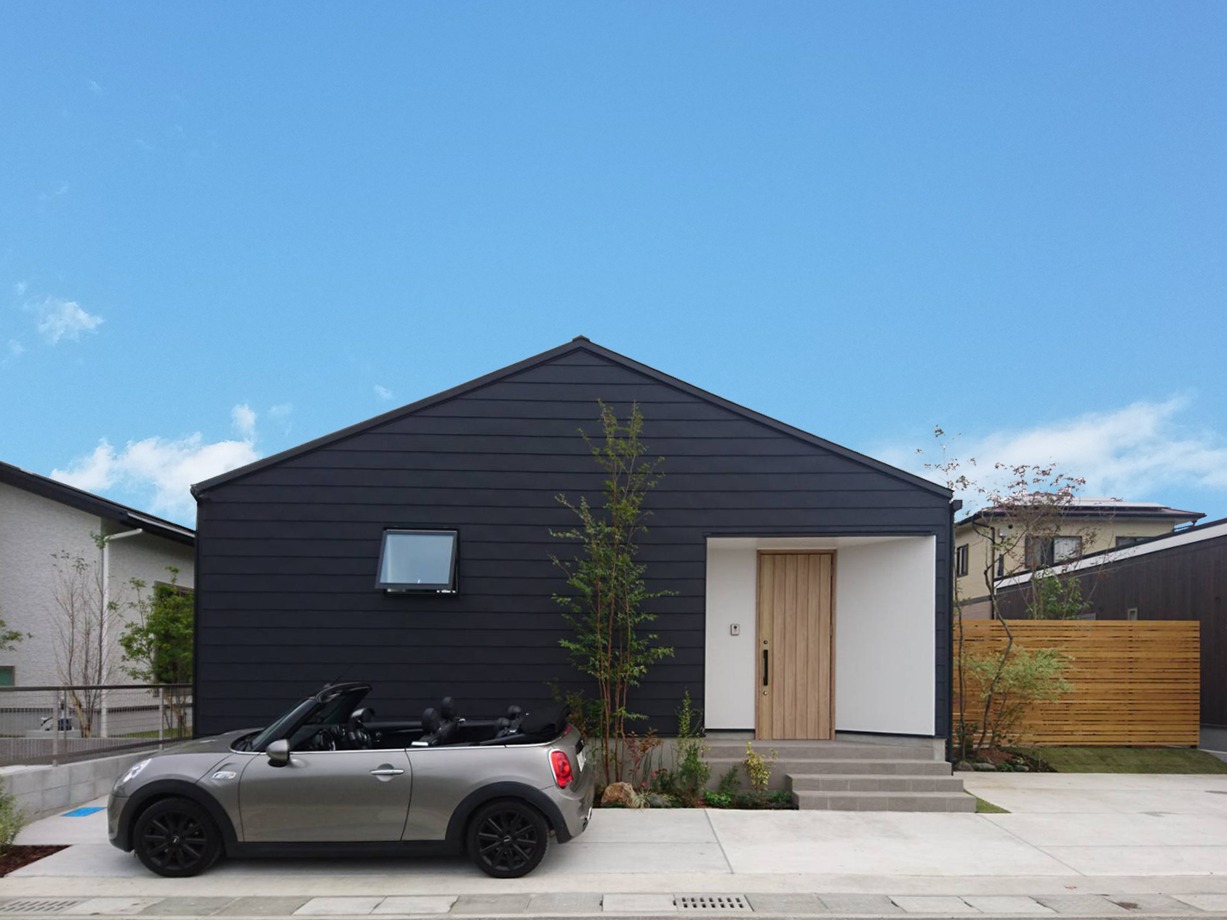 アーキコラボ一級建築士事務所 三角屋根のかわいい平屋のおうち ブラックのガルバリウムの横葺きと対照的に 玄関ポーチはホワイトに張り分けて シンプルだけど可愛くて ちょっとカッコイイ家に仕上がりました 鹿児島 鹿児島注文住宅 新築 マイホーム