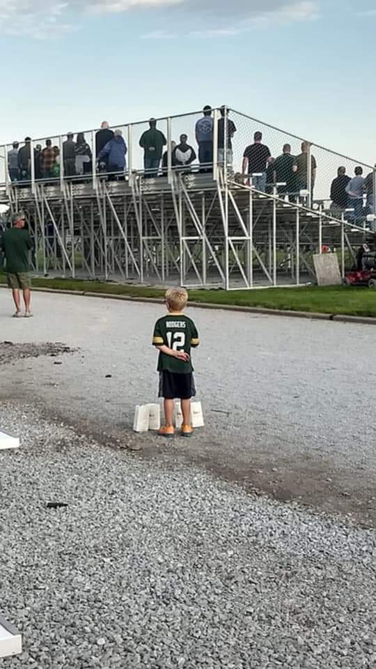 hollar4mimi's tweet photo. This little boy set down 
his 4 bags of popcorn while 
the National Anthem 
was being sung at Loomis, NE. 
Somebody's doing something right!! https://t.co/KfXIcxPyoQ