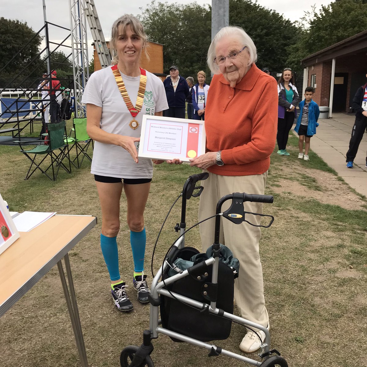 Margaret Simpson receiving her life membership. Her husband Colin was member No 1 in 1971