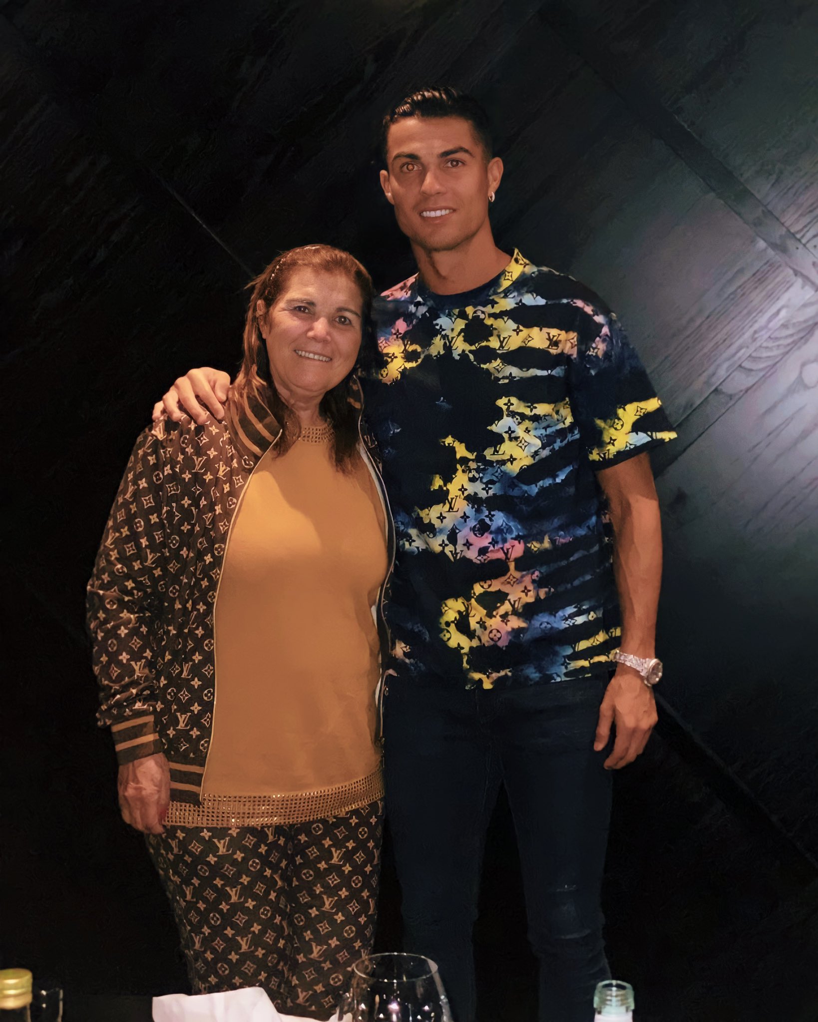 Footballer Fits on X: Manchester United's @Cristiano celebrating that  debut brace with his mother wearing Louis Vuitton's monogram tie & dye  printed t-shirt (£695). Mum and Son dripped out 😮‍💨💧   /