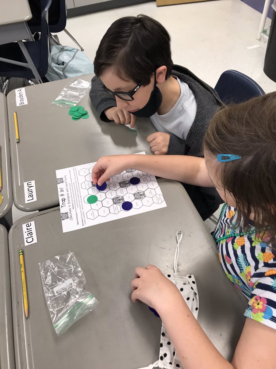 KimGlover9's tweet photo. Working with decimals in standard form and word form by capturing monsters. @TweetDCS_OES #teamdcs https://t.co/ynNfvABKjL