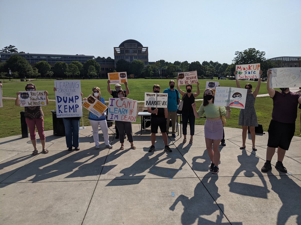 KsuUcw's tweet photo. Our first speak-out of the week aligned with the KSU chapters of @aaup, @YDSA_KSU, and @youngdemsksu was a success. Students and faculty standing in solidarity to against COVID UN-safety cultivated by @BORUSG. #MaskOnUSG! https://t.co/Fr6wv4O1oz