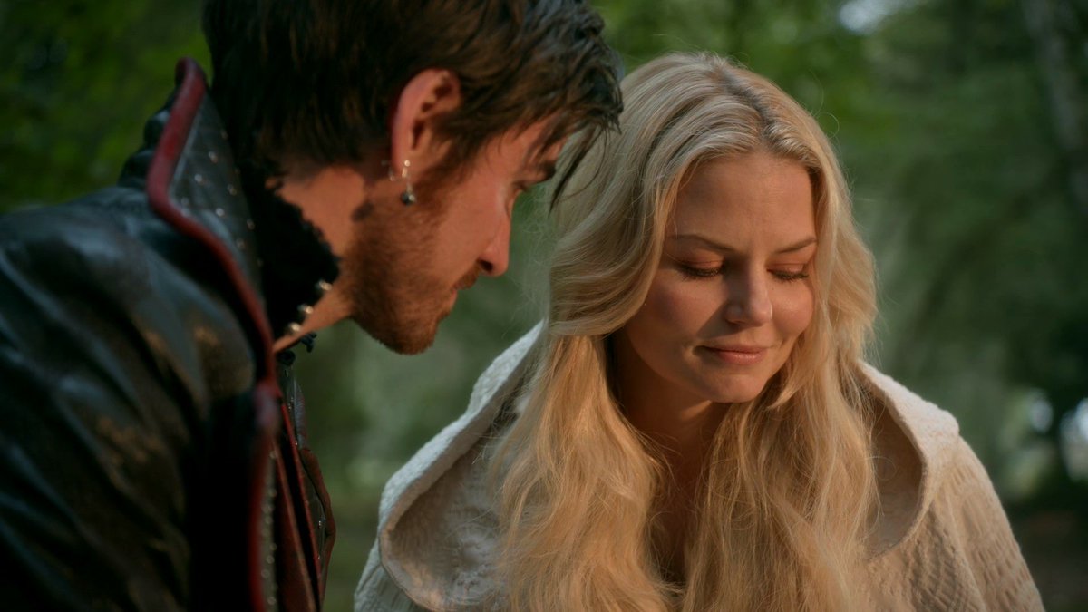 this photo is Emma and Killian smiling watching baby Hope sleeping in her stroller and I just can’t unsee it