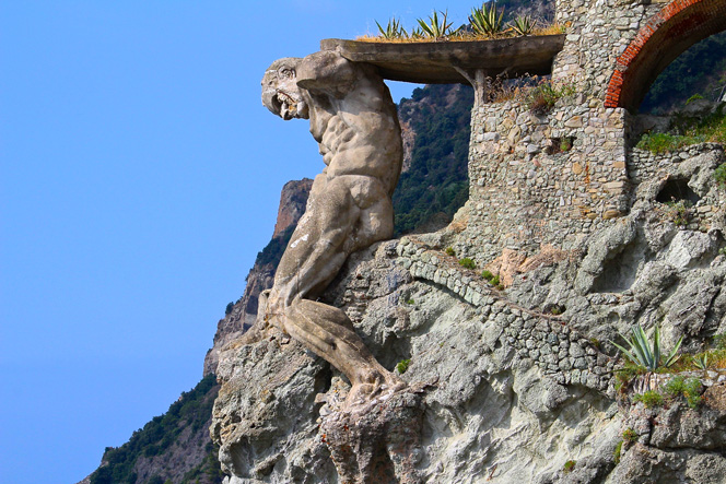 "The Giant" by Arrigo Minerbi (1881-1960), meant to represent Neptune. Fegina Beach, Monterosso al Mare, Italy. 1910. Photo via Italianways, Meg Carriero.